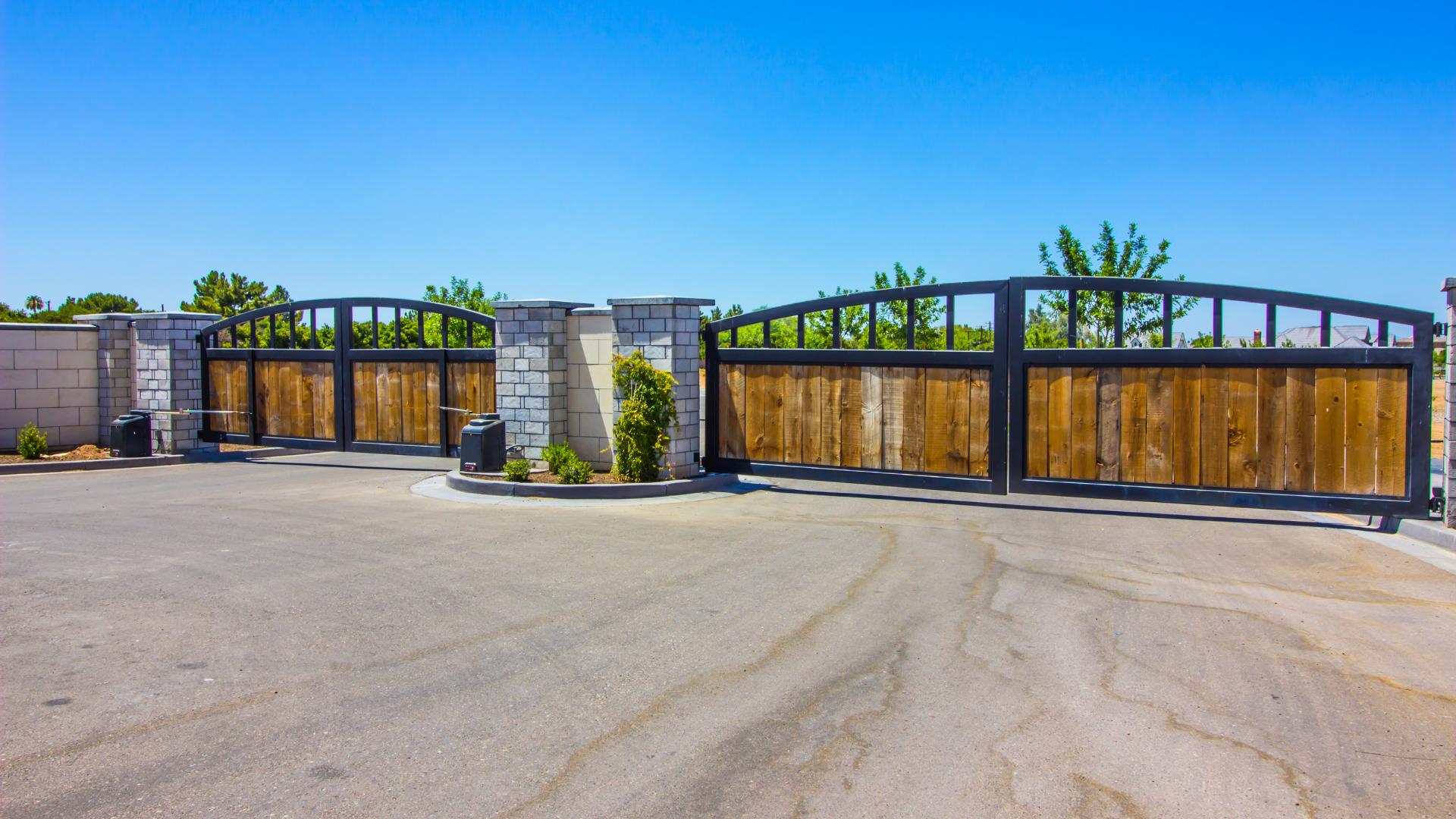 ParkPro team calibrating and testing automatic gate operation after repair